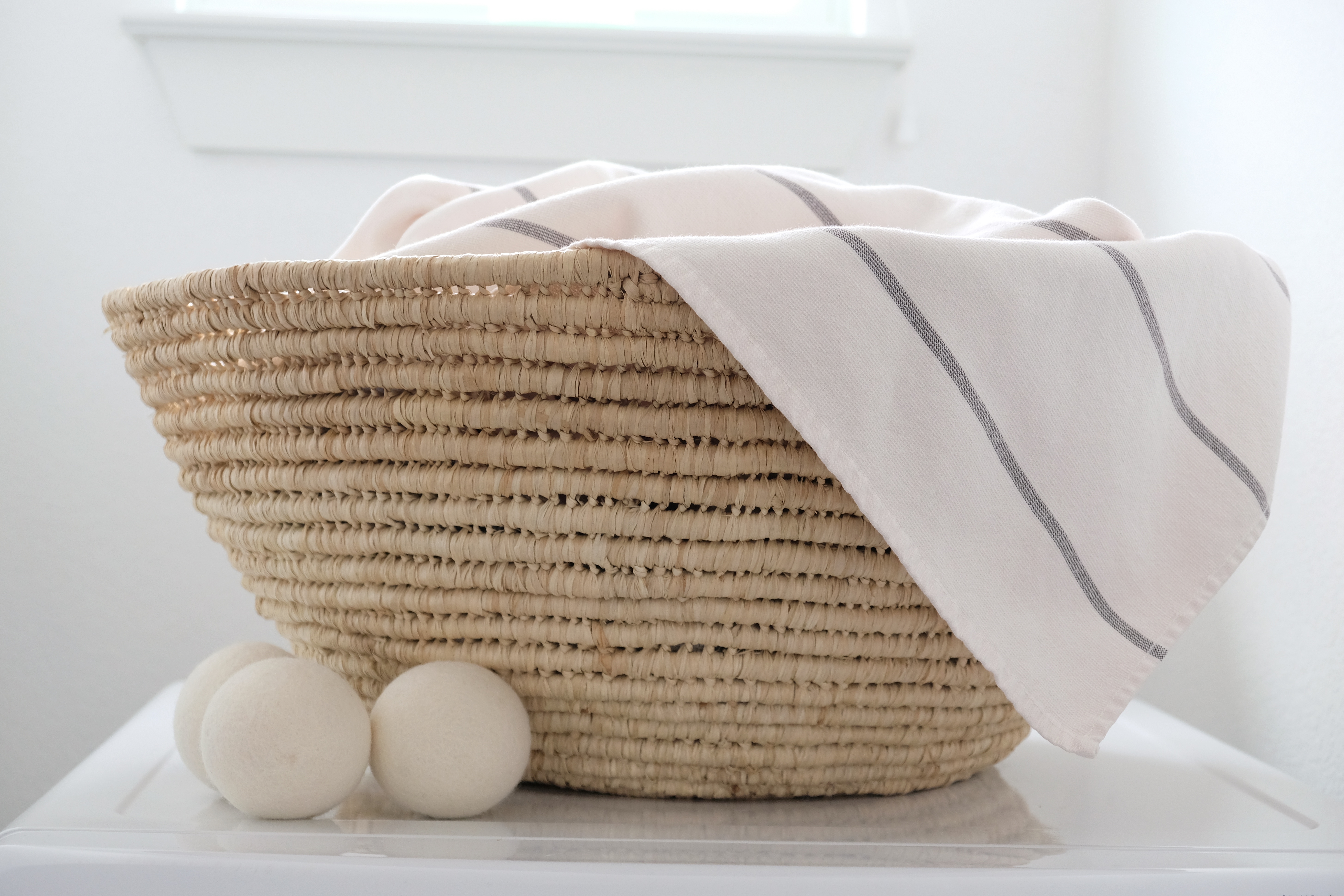 Laundry basket with reduced-waste items that are affordable, stylish and sustainable. Here are 10 easy swaps to get you started on reducing waste in your home.